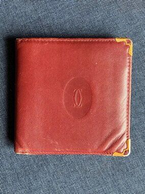Cartier Red Leather Wallet with Gold Corner Accents